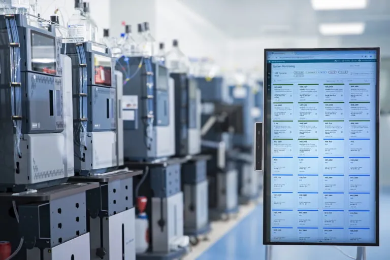 lab equipment next to one another with computer screen