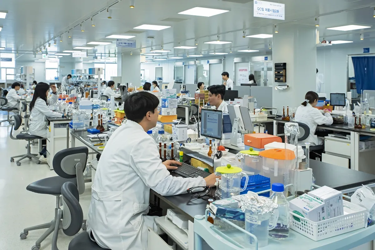 lab technicians and scientist working in lab on computers