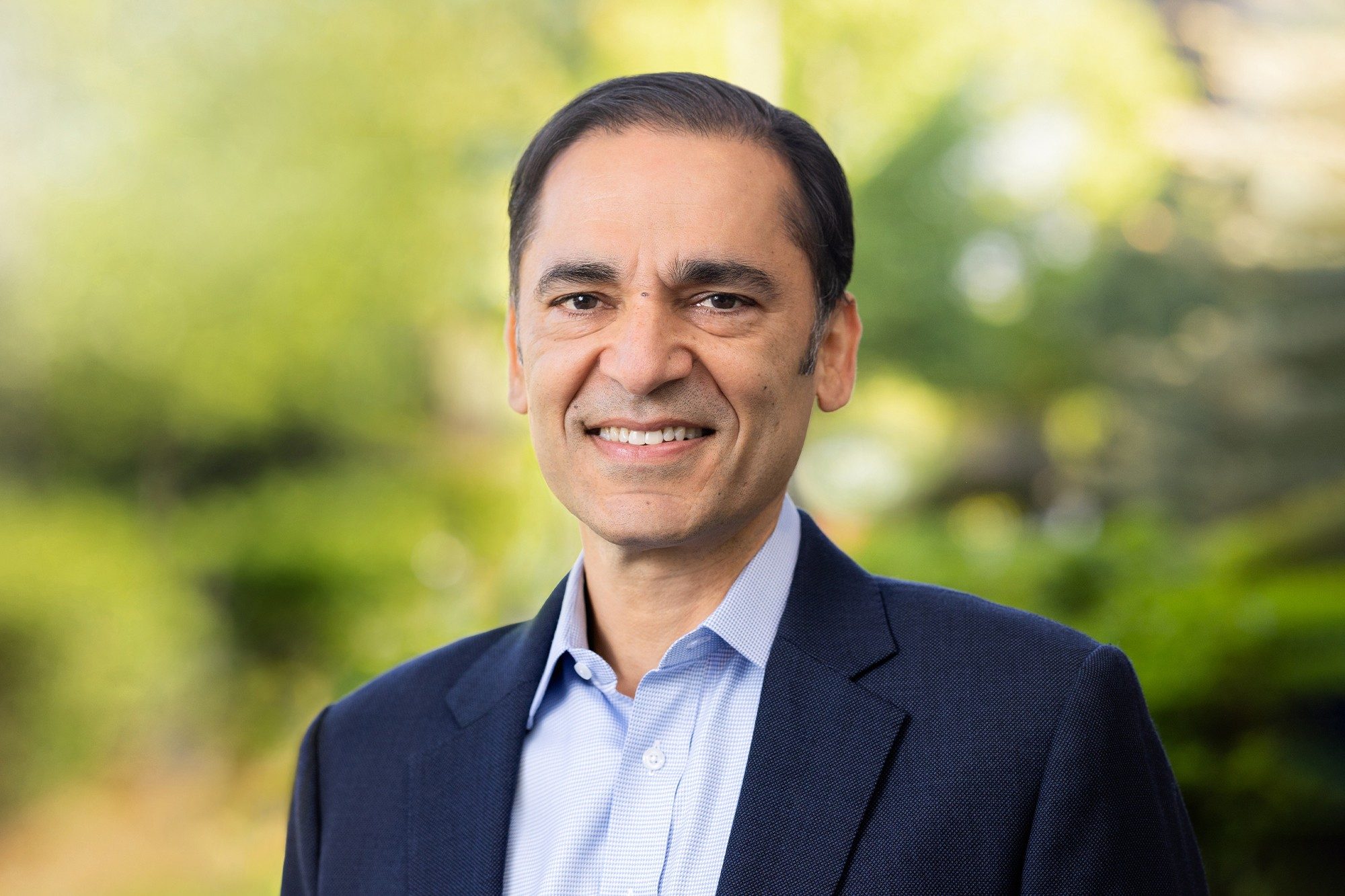 Udit Batra smiling at camera