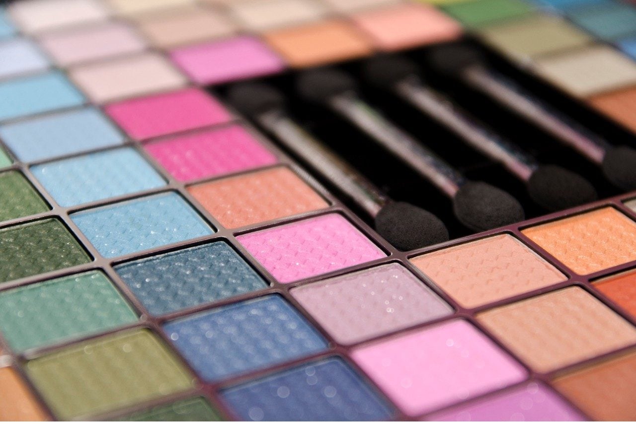 Eyeshadow palette with brushes closeup