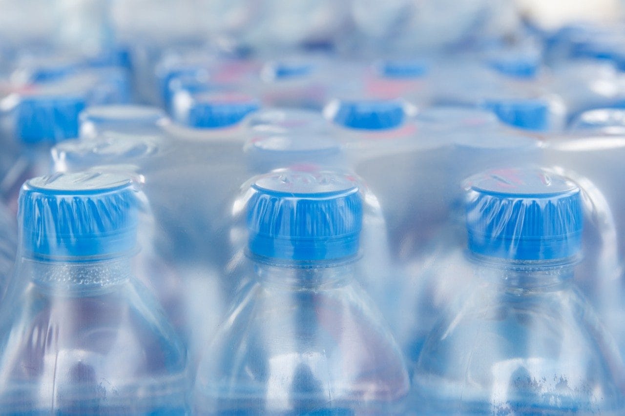 Water bottles in plastic wrap