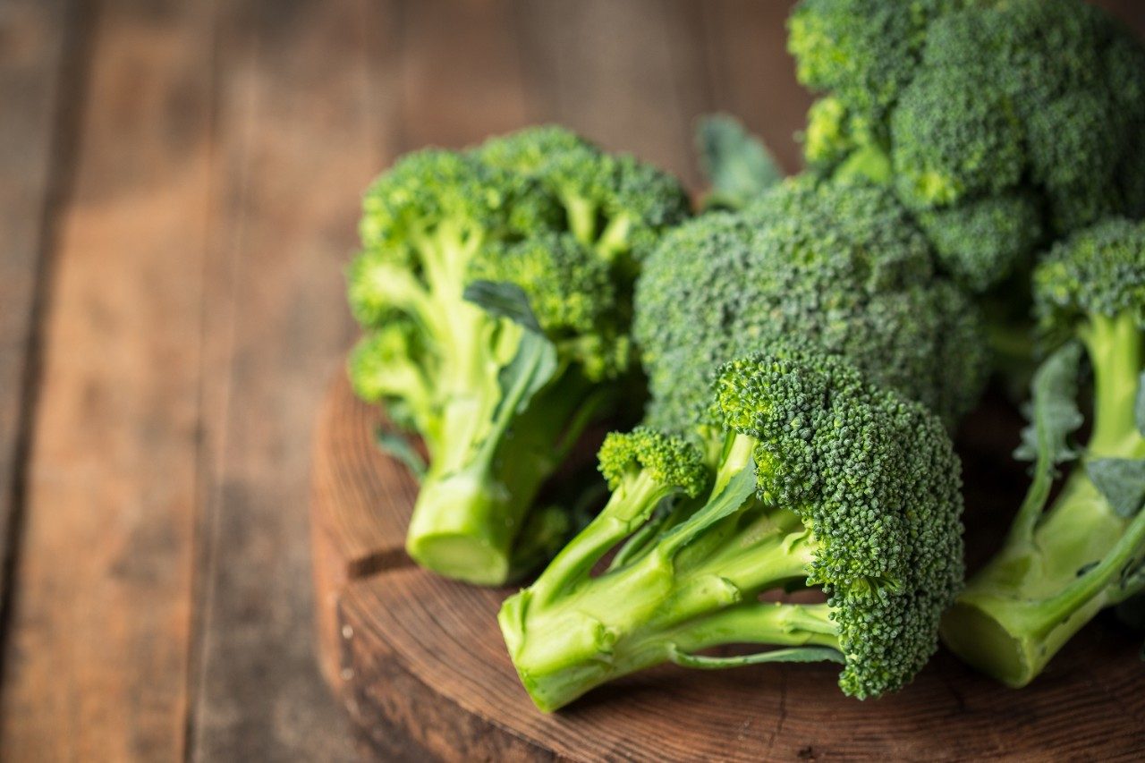 Broccoli crowns on table