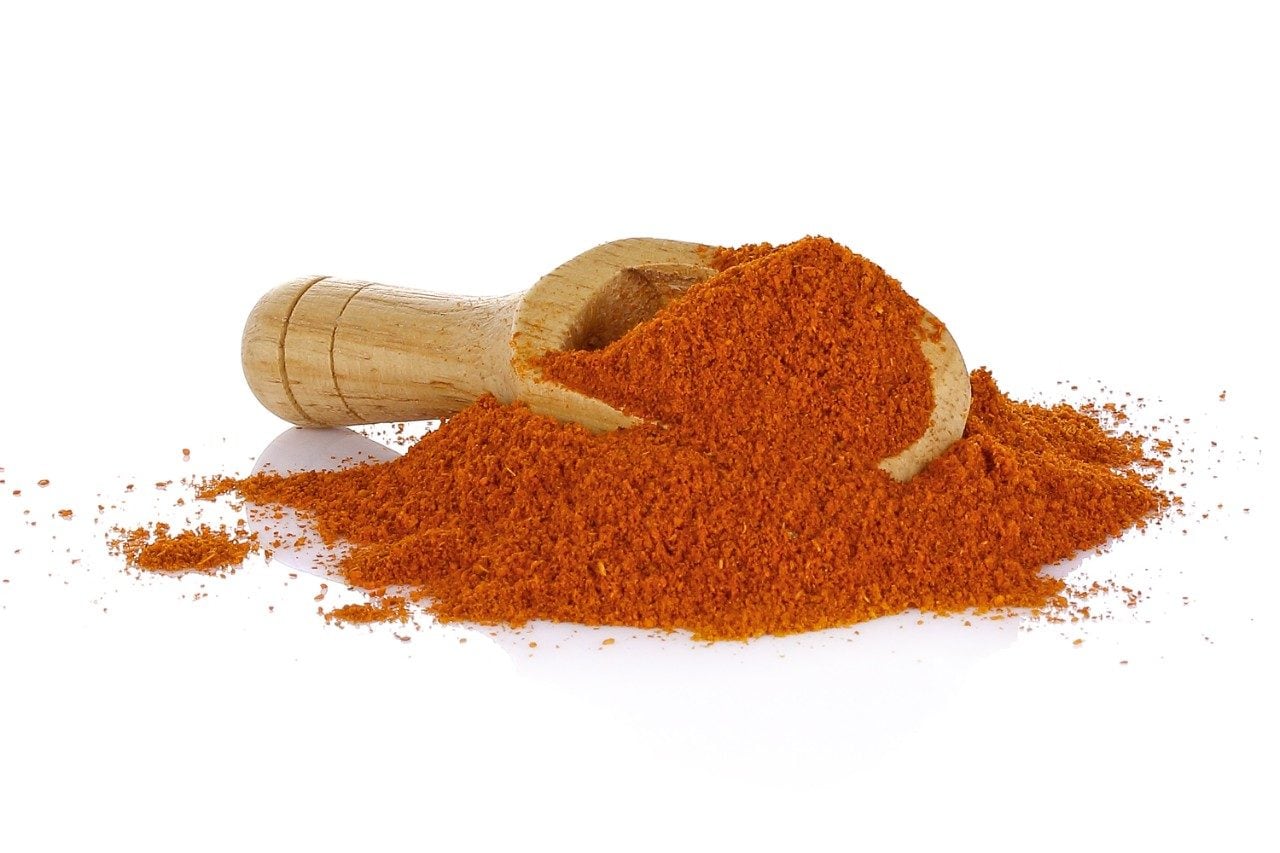 Chili powder on white background