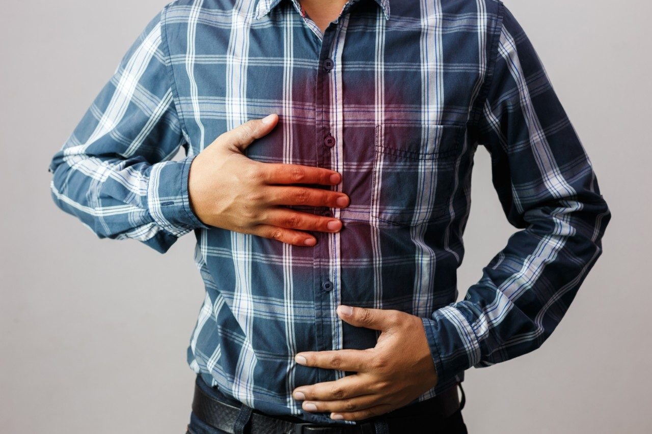 Symptoms of burning sensation in chest caused by acid reflux