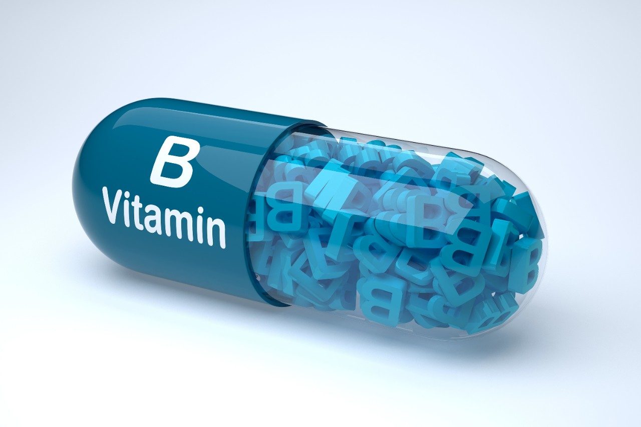 Blue pill or capsule filled with vitamin B